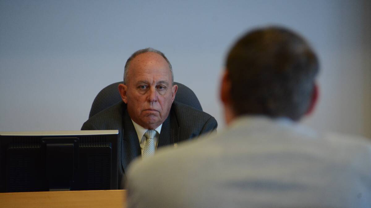 MidCoast Council administrator John Turner hears from a member of the public during a meeting held at the former Greater Taree City Council chambers on June 8. He has praised the staff of the merging councils in the transition.