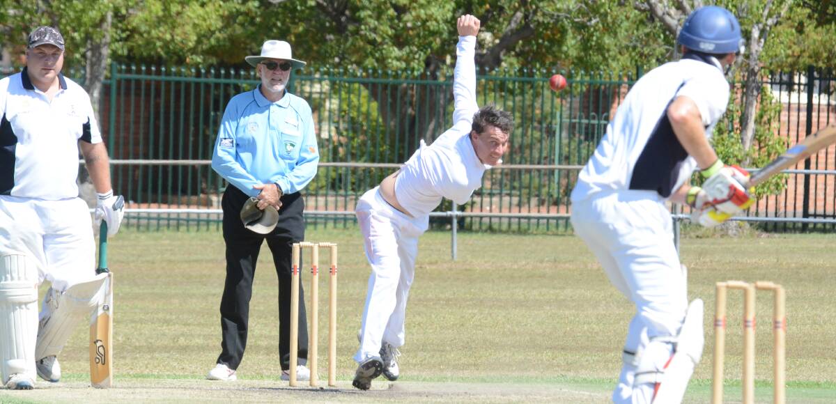 Josh Davis sends down a delivery for Wingham in the first grade clash against Taree West at Johnny Martin Oval.