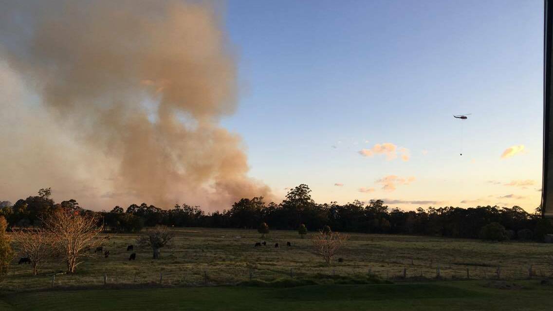 Wind fanned the fire on the Lakes Way, Tuncurry last week,