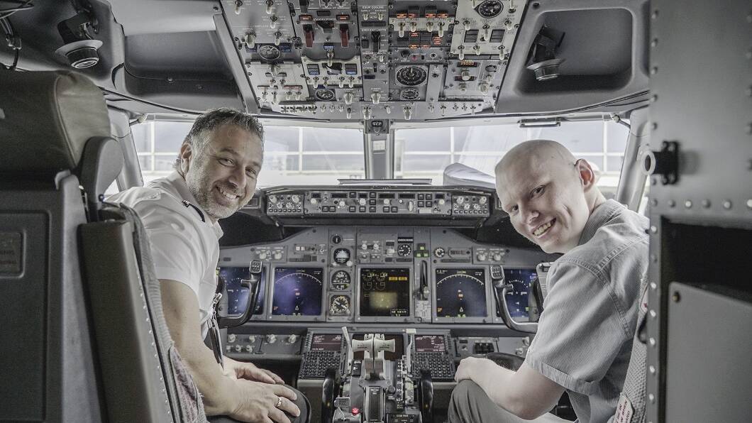 In the flight simulator: Mitchell was awarded a surprise internship with Virgin Australia, Starlight’s official Wishgranting partner, to kick start his career in aviation.