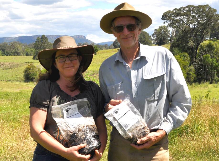  INNOVATION: Cathy Eggert and Jeremy Bradley with 'Parra Trooper' a new soil fungus capable of affecting Giant Parramatta Grass leaving a healthy pasture mix.
 