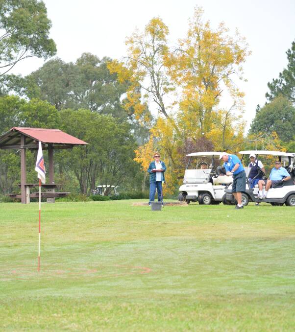Day one of the competition: Players enjoy the additional chipping competition during the first day of the Veterans Week of Golf. Picture: Anne Keen