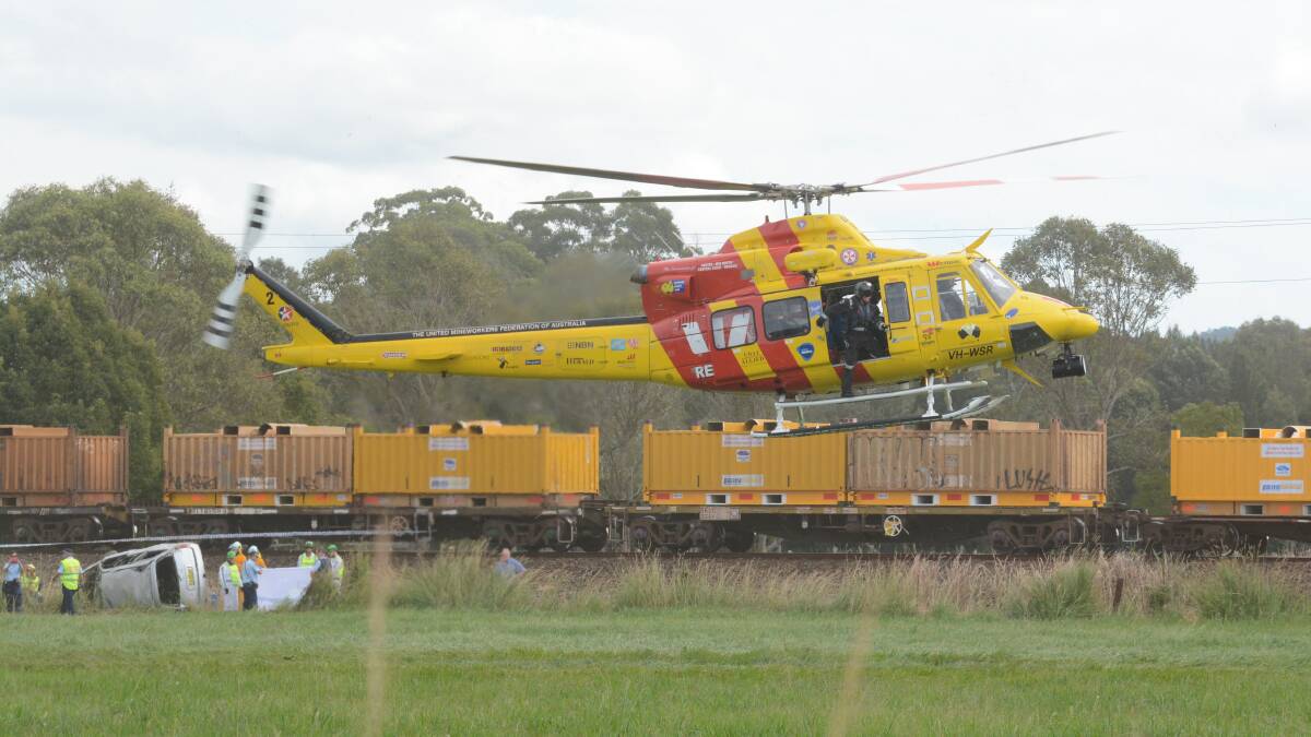 The Westpac Rescue Helicopter at the crash site, shortly before airlifting one of the passengers to John Hunter Hospital. 

