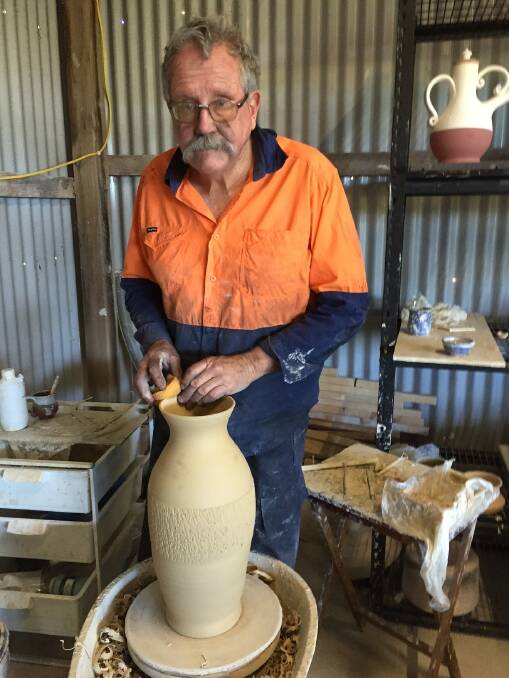 Bruce Kerr working at his Burrell Creek studio, creating clay creations. Bruce will showcase his work at the Killabakh Day in the Country. Photo: Submitted