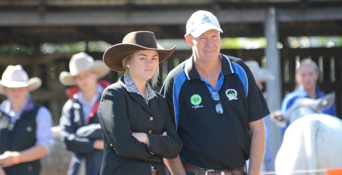 An educational experience: Brooke Anderson with Wingham High School agriculture teacher Charlie Cassels in the cattle ring at Beef Week 2016. Photo: Scott Calvin.