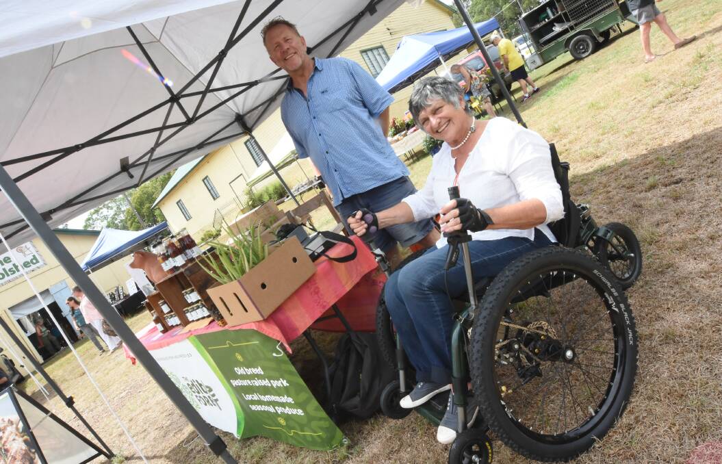 Annette Owen-Mulder on her new Mountain Trike with husband Les at the Wingham Farmers' Market. Photo Scott Calvin