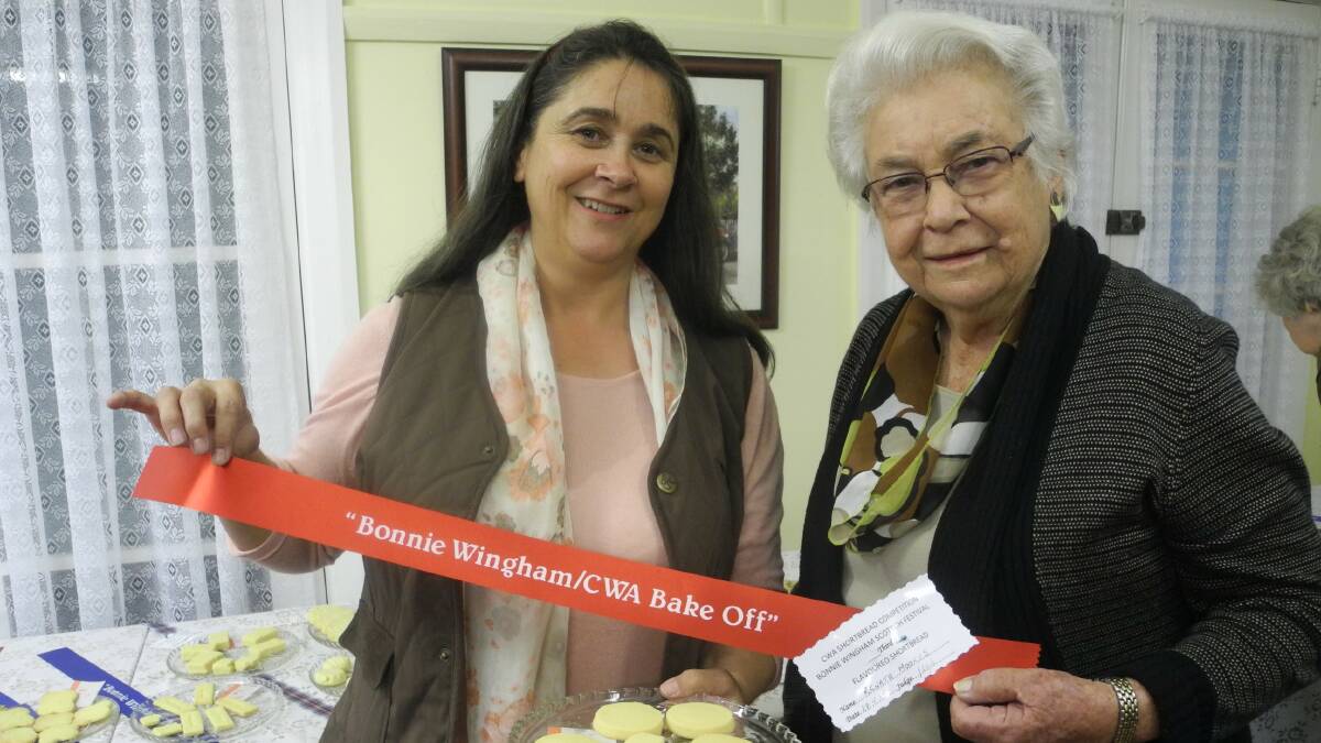 Lucky winner: Previous ribbon winner Renata Moores with judge Jac Hyde during the Bonnie Wingham Scottish Festival CWA Bake Off. Dig out your aprons and grab your entry forms now for the 2017 competition on June 2.