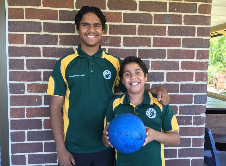 Sibling rivalry: Brothers Braithe and Bronson Waites of Wingham have both recently represented Australia overseas in Futsal. The highly competitive pair also play soccer for Wingham. Photo: Sam Brownrigg