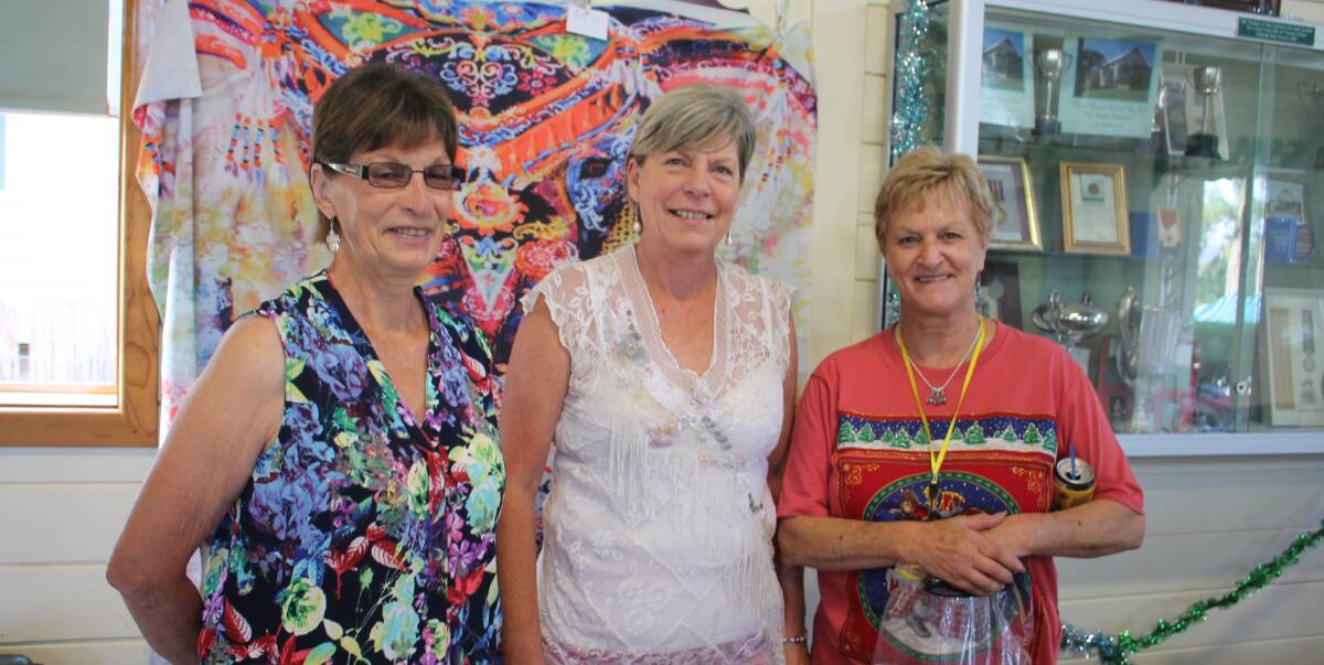 Great day: Two Nannys stall holders Nancy Low and Debbie McGarry, with Lesley Tonkin, coordinator of the Christmas Fair, at Tinonee Hall. 