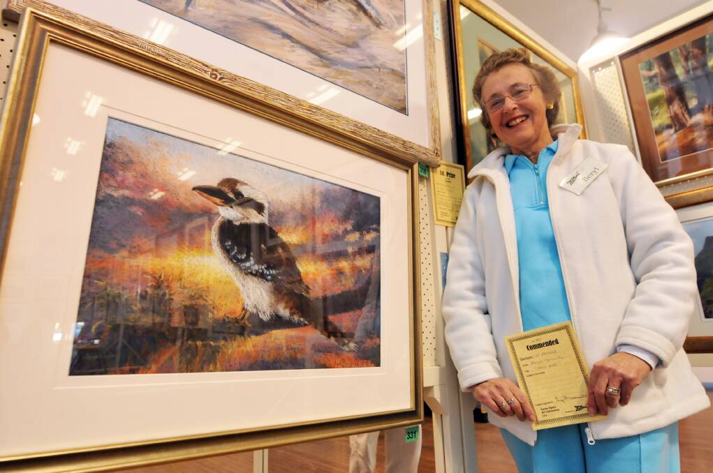 Taree Artists Inc president Beryl Moriarty urges the community to take part in the People’s Choice Award at the exhibition.