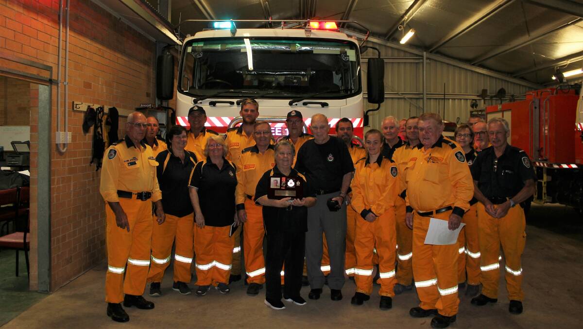 The Tinonee Rural Fire Service with Shirley and Bill Snowden.