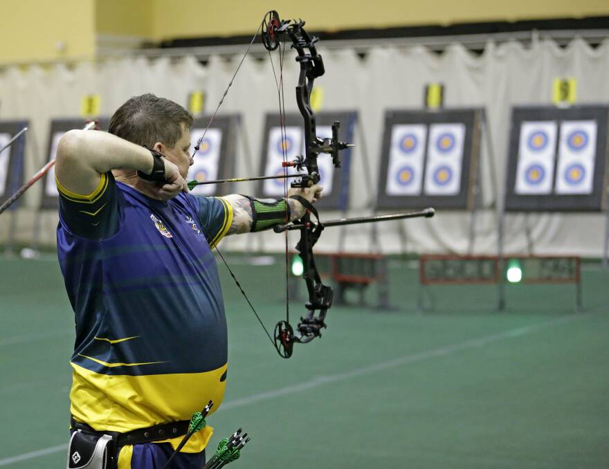 Darren Robinson competes in an archery event at ESPN Wide World of Sport Complex, Orlando, Florida, in the 2016 Invictus Games. Photo courtesy of Department of Defence.