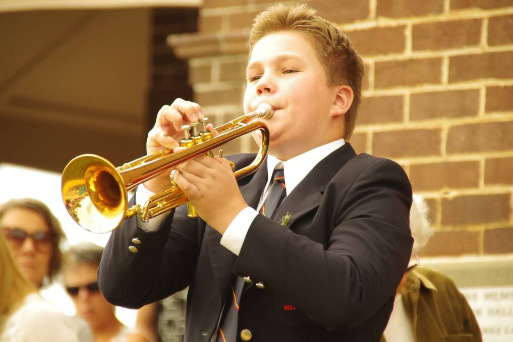 Perfect rendition: Year seven student Lincoln Harrell filled the crowd with admiration and astonishment with his performances at Wingham Anzac ceremonies. Photo: Julia Driscoll