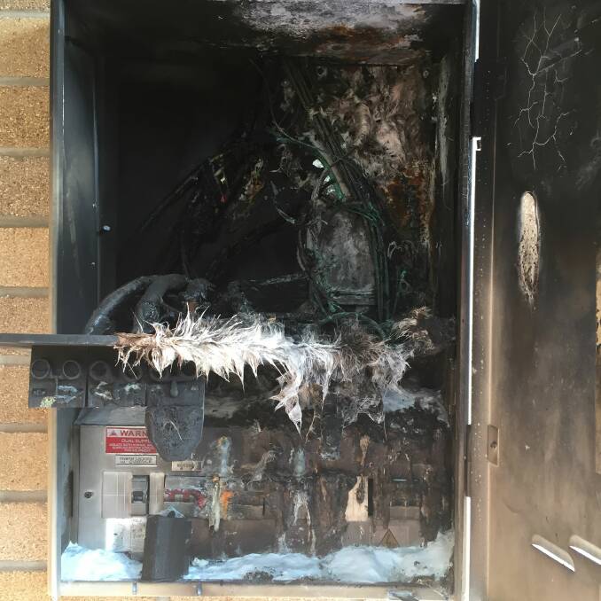 Melted mess: Firefighters were concerned as the power box kept arcing and re-igniting making it difficult to extinguish. Photo: Julia Driscoll