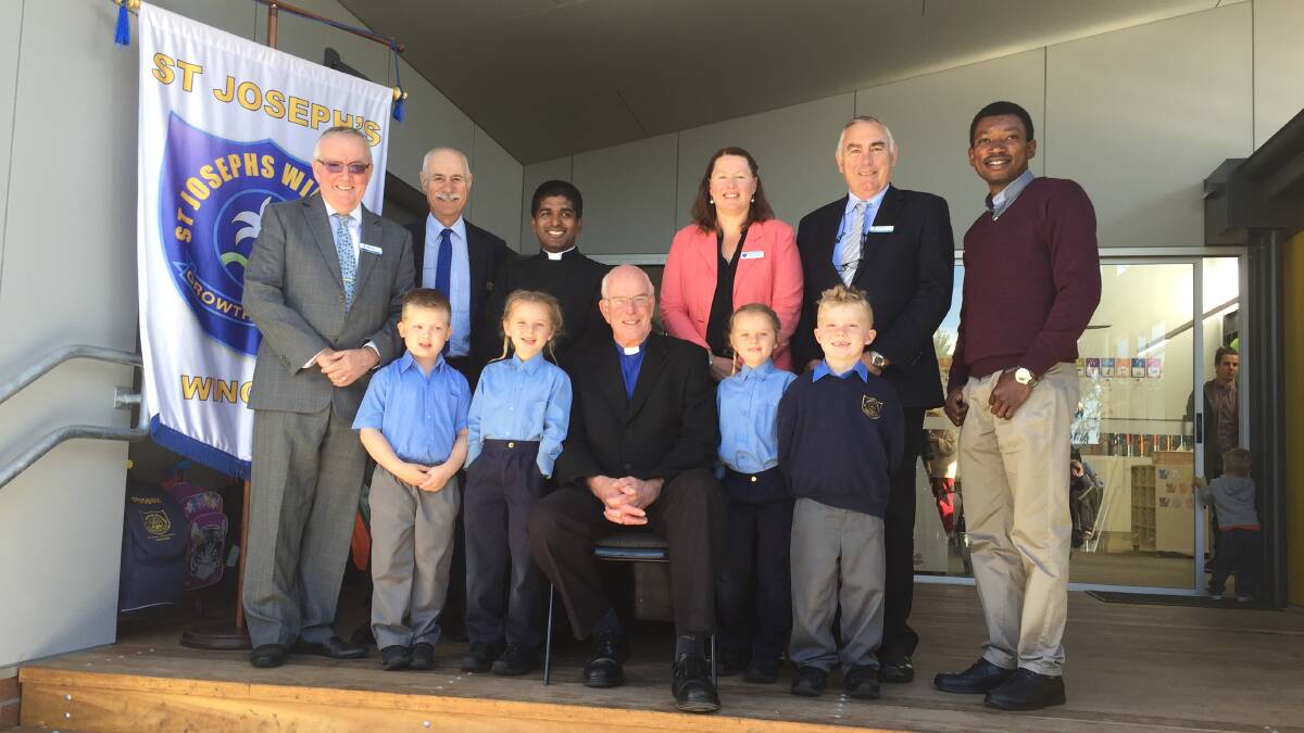 Bishop Bill Wright with special guests Tony Kelly,  Peter Nicholls, Father George, St Joseph's principal Emma Timmins, Dr Michael Slattery, and Father James.