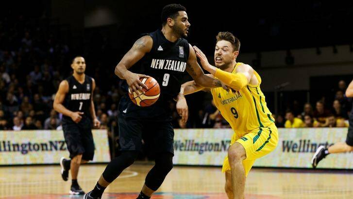NBA hopeful: Corey Webster is challenged by Matthew Dellavedova during game two of the New Zealand Tall Blacks versus Australian Boomers series. Photo: Hagen Hopkins