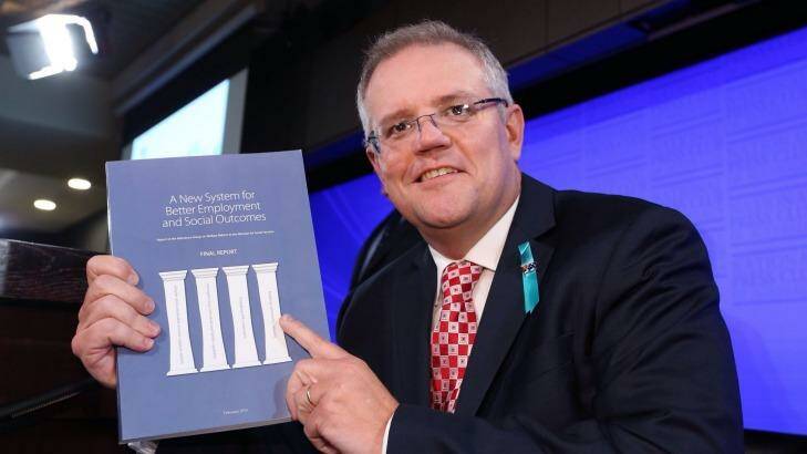 Social Services minister Scott Morrison with the McClure report. Photo: Andrew Meares
