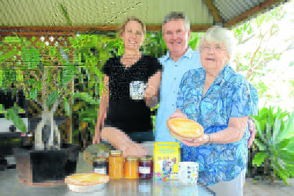 Baking for a Cuppa in the Country : Jenny Mitchison, and husband Rob with Alice Mitchison who is making her famous pies for the Cancer Council appeal.
