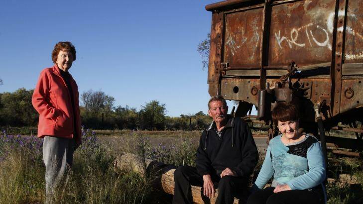 Siblings Lorraine Cole, Barry "Fred" Cowie and Peggy Corney visit the site of the Broken Hill picnic train attack where their aunt, Alma Cowie was shot dead in 1915. Photo: Sam Scotting