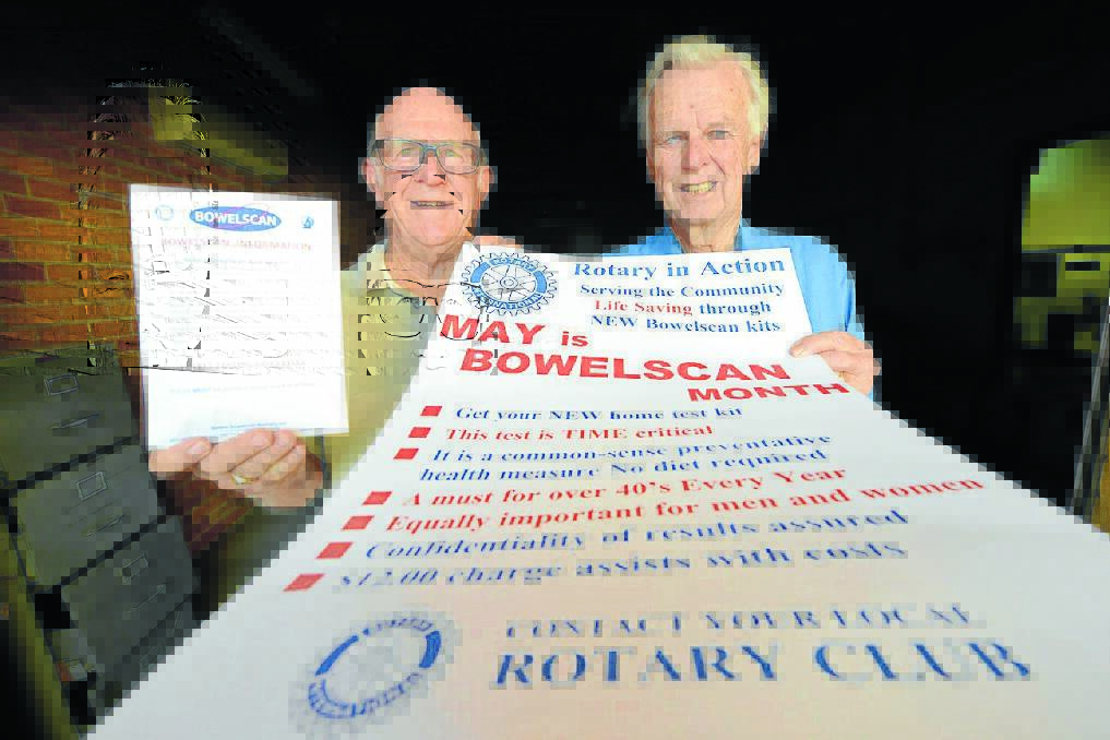 Taree Rotarians Kevin Sharp and Max Carey spreading the bowelscan message.