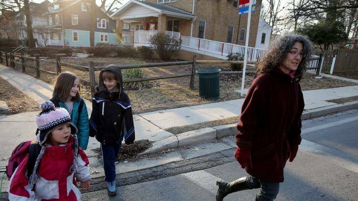 Danielle Meitiv, right, walks home with her daughter  Dvora Meitiv, 6, left, Rosie Resnick, 9, and her son Rafi Meitiv, 10. Photo: The Washington Post
