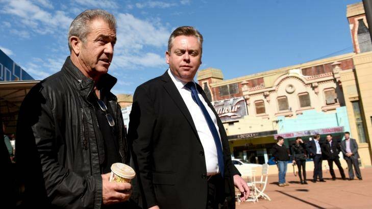 Directing again: Mel Gibson with Industry, Resources and Energy Minister Anthony Roberts. Photo: Steven Siewert