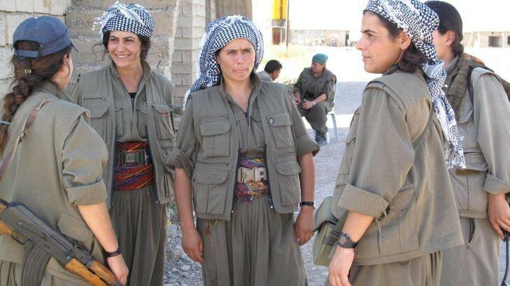 Commander Nuve Rojhat (centre) with some of the fighters in her unit at the Daquq PKK base. Photo: Ruth Pollard