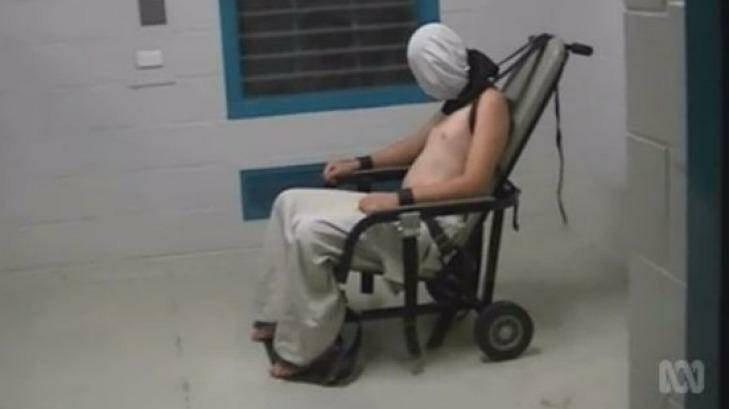 The ABC's <em>Four Corners</em> program showed Dylan Voller, then 17, with a hood over his head and strapped into a chair by his ankles, wrists, shoulders and neck.  Photo: ABC