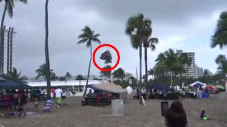 The jumping castle flies through the air at the Florida beach. Photo: Screenshot, SunSentinel