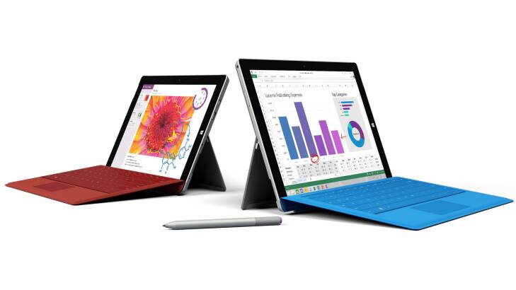 The Surface 3, left, with its larger sibling the Surface Pro 3 and the Surface Pen. Photo: Supplied