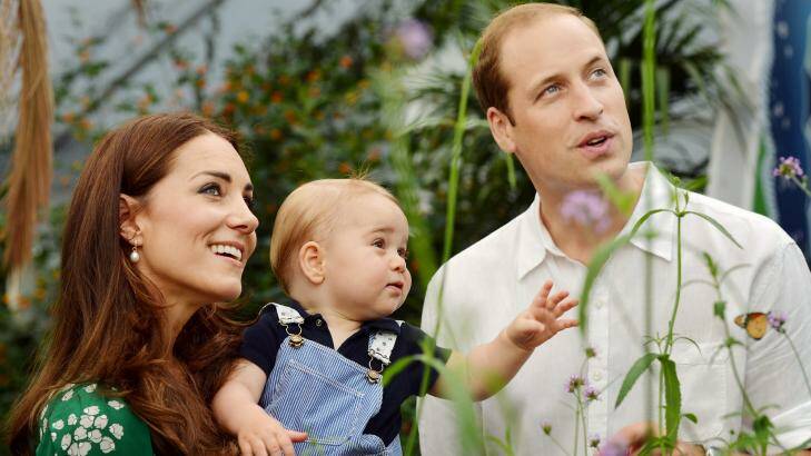Catherine, Duchess of Cambridge holds Prince George as he and Prince William, Duke of Cambridge's look on while visiting the Sensational Butterflies exhibition at the Natural History Museum on July 2, 2014 in London. Photo: John Stillwell - WPA Pool/Getty Images