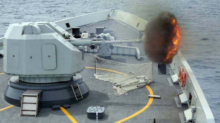 An anti-surface gun is fired from China's Navy missile frigate Yulin during "Exercise Maritime Co-operation 2015". Photo: Xinhua News Agency