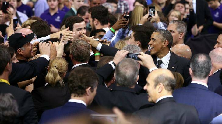 Crowd appreciation: Greetings from President Obama following his speech at the University of Queensland. Photo: Alex Ellinghausen