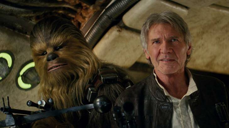Harrison Ford as Han Solo with Chewbacca in Star Wars: The Force Awakens.