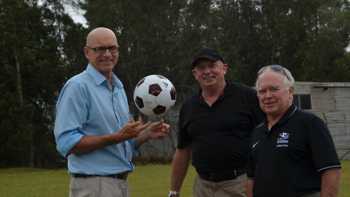 Football Mid North Coast's newly appointed general manager Peter Daniels with board members Mike Parsons and Graham Pilkie.