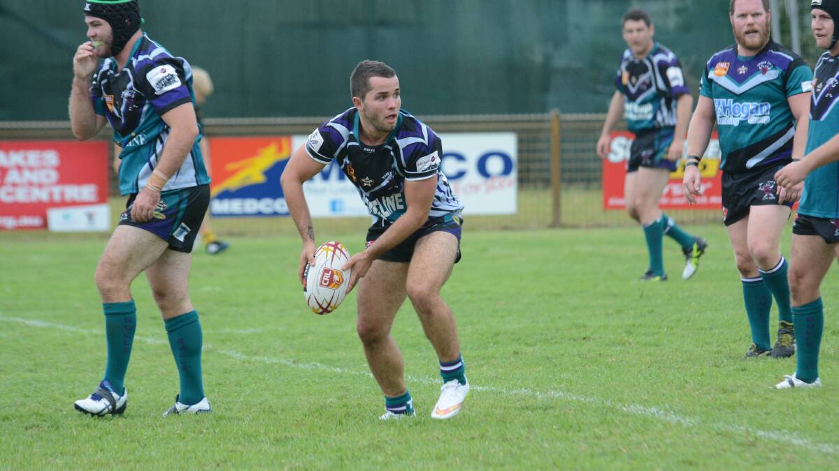 Taree City halfback Mick Henry about to pass during the opening round of the XX Trophies Group Three Rugby League pre-season. Taree meets Port City in the semi-final on Sunday at Old Bar while Wingham plays Port Macquarie.