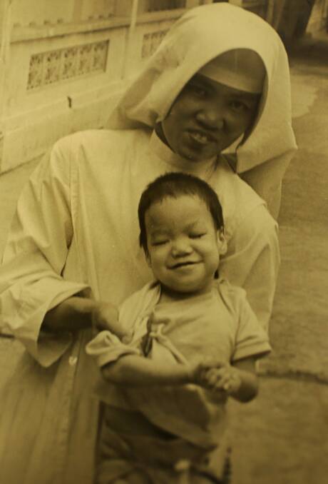 Emma Pham with a nun in Vietnam.