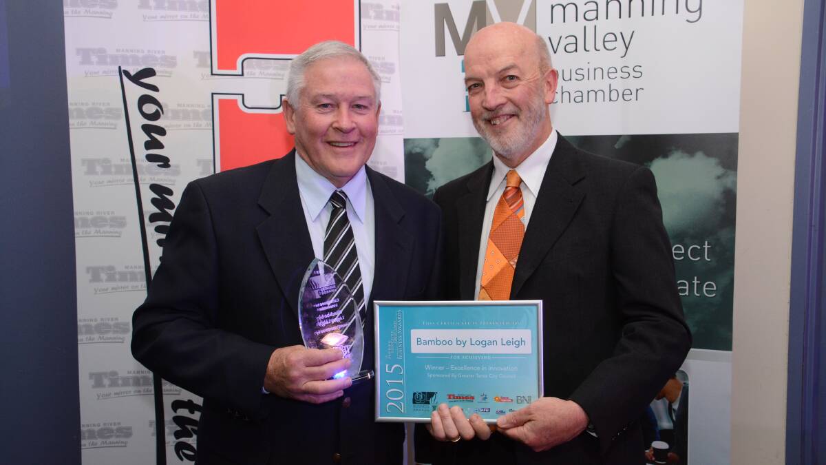 David Embury of Bamboo by Logan Leigh accepting the sustainability award at the 2015 Manning Great Lakes Gloucester Business Awards from Ron Posselt, general manager of Greater Taree City Council, which sponsored the award. Mr Embury and his business are finalists in four categories of the Mid North Coast Business Awards.