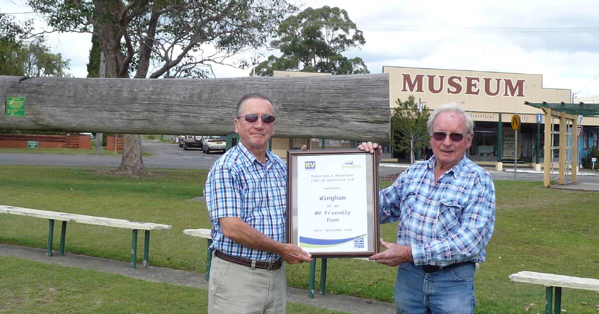 Wingham Advancement Group's Allen Valentine and Ron Sky with the official certificate declaring Wingham an RV Friendly Town.