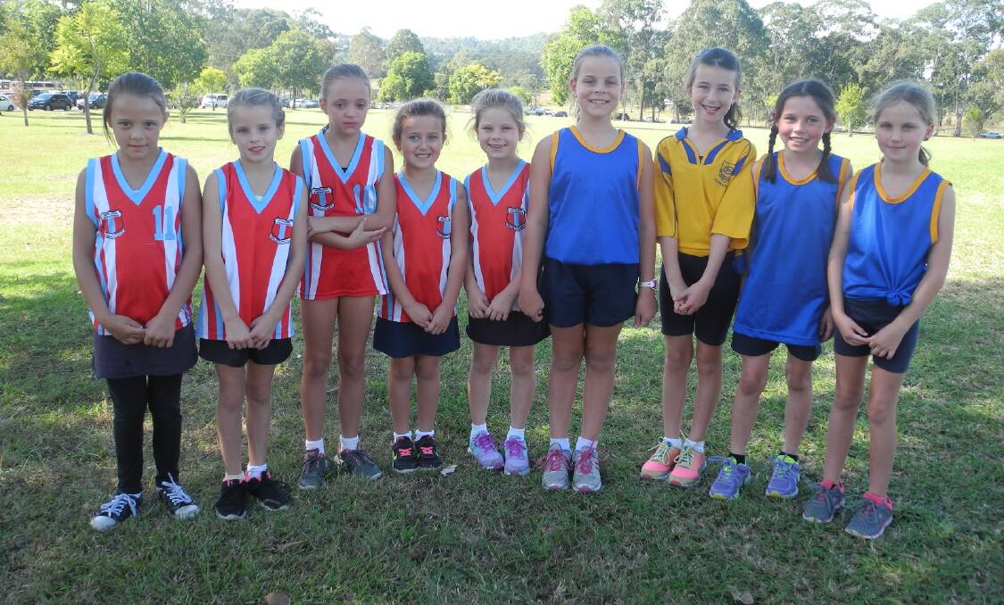 Getting ready to race more than 70 competitors in the girls 8/9 years were Wingham Public School's Ciara Kennett, Amelia Haddow, Laura Darby, Lara Ferris and Addison Knoke with Gloucester Public School's Mackenzie Schafer, Olivia Kearney, Jessica Howard and Emily Beggs.