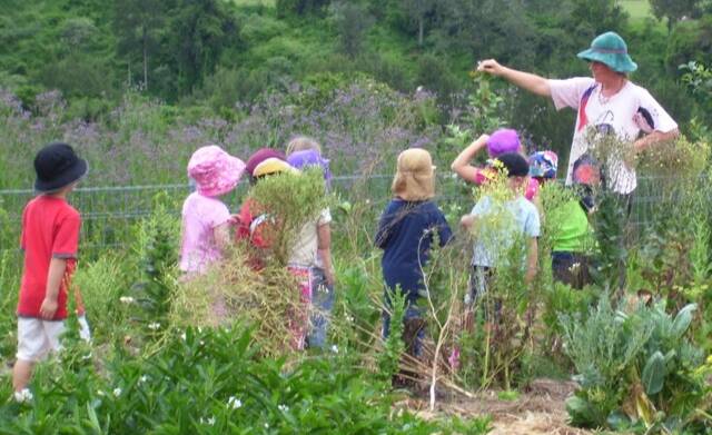 Meagan Lewes takes a group of budding gardeners for a tour of the Community Garden at Manning Valley Neighbourhood Services in Wingham.