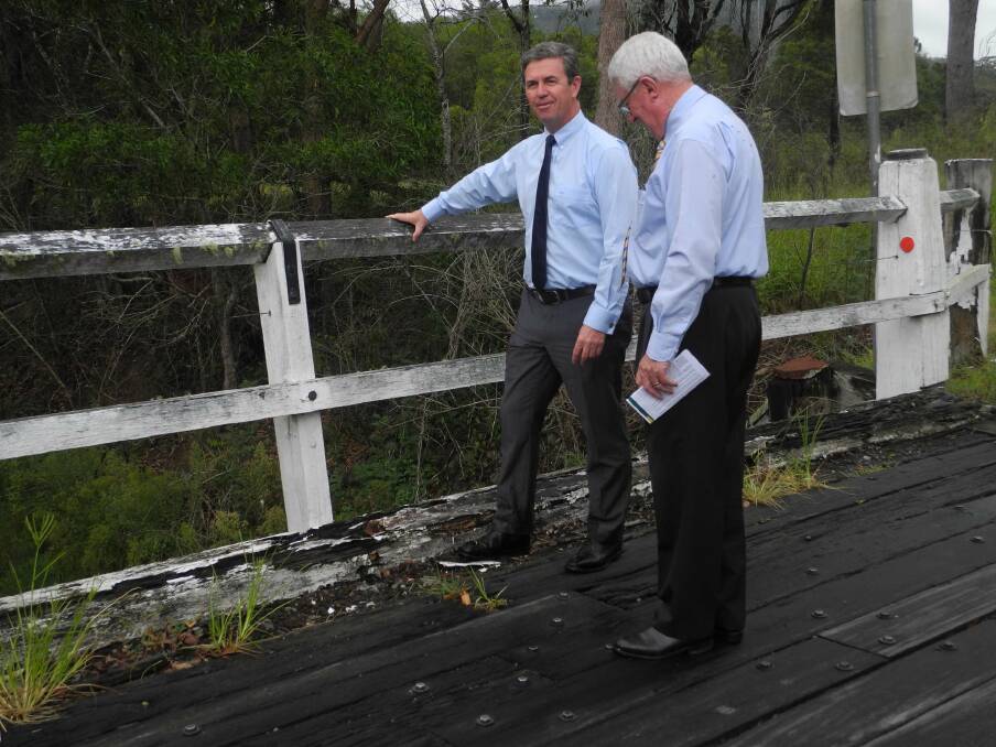 Dr David Gillespie, federal member for Lyne, and Greater Taree City Council Mayor Paul Hogan inpsect Potts Bridge