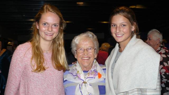 German exchange students Ida Keussen and Phelina Schuttke with their host grandparent, Noreida Fotheringham.