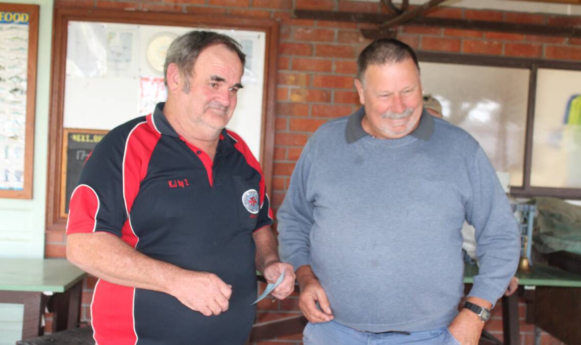 Bluewater fishing club: president Jack presenting Les Rose with his river section award voucher