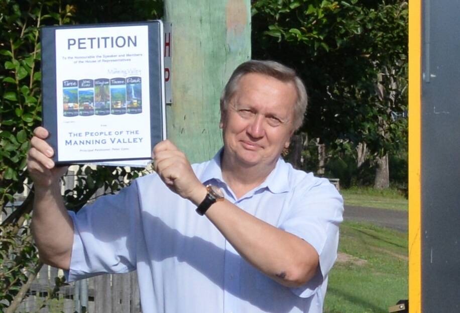 Cr Peter Epov with the 'People's Petition"