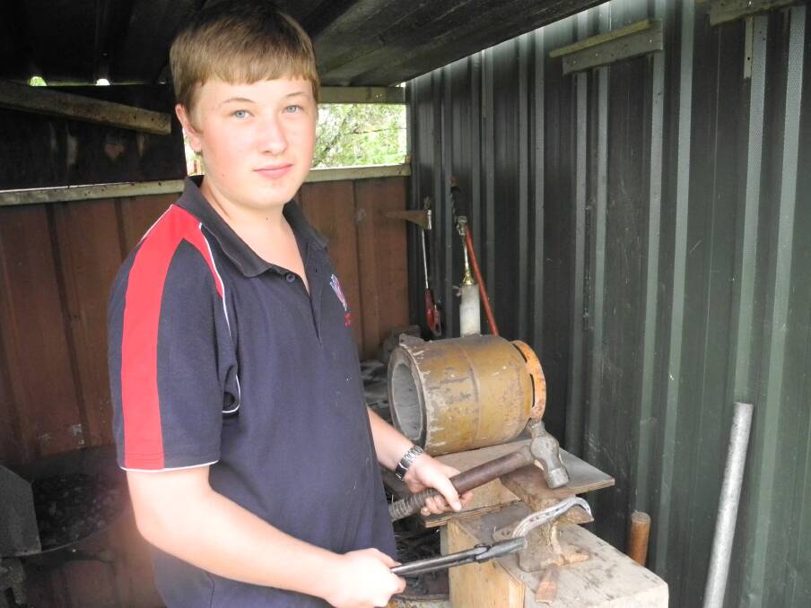 Charlie Turner 14 in his homemade Forge