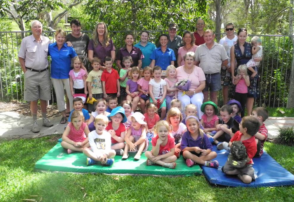 Staff and children of Wingham Preschool with members of the Wingham Men's Shed were present for the unveiling of the Don Forbes memorial plaque by his widow Robyn