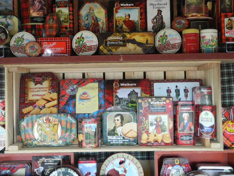 A selection of the 164 shortbread tins on display in the window of Wingham Museum