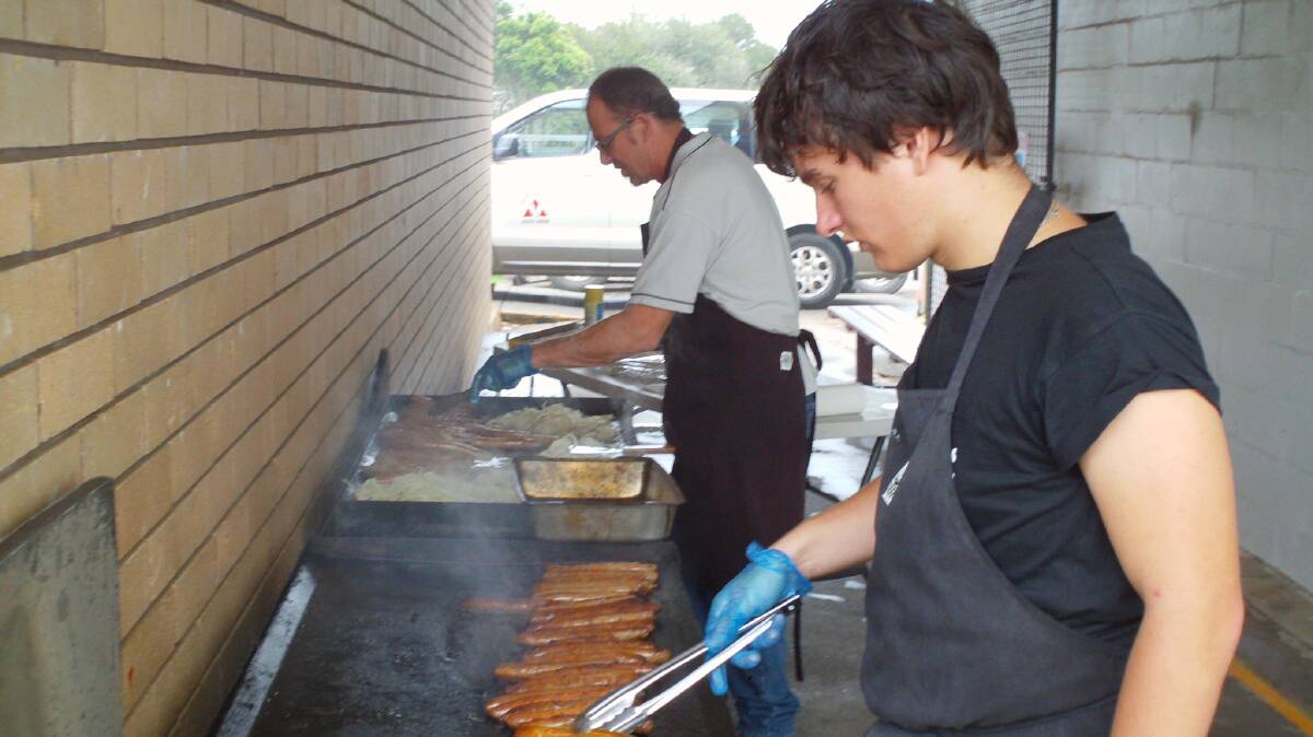 Jon Cross and Aaron Everingham cook up a storm at the Valley Industries Dollar4Drought Campaign fundraiser.