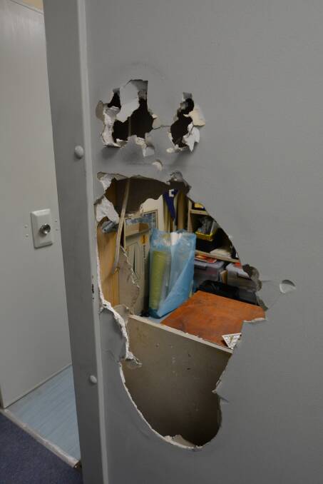 One of numerous smashed walls at Tinonee Public School.